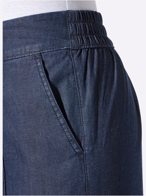 Jean à la coupe haute avec jambes larges et ceinture élastique - Taille standard - Moda Vilona - Kiabi