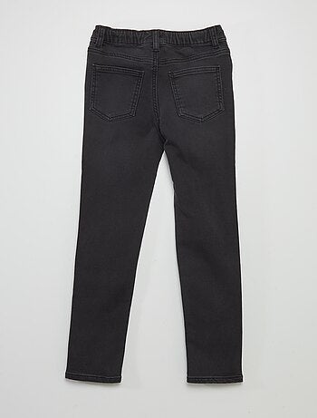 Jean à taille élastiquée avec cordons