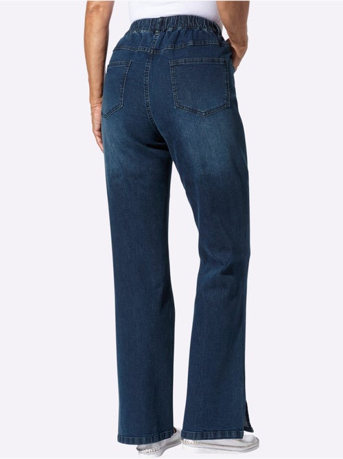 Jean avec jambes larges et fente à la finition - Taille standard - Moda Vilona - Kiabi Jean avec jambes larges et fente à la finition - Taille standard - Moda Vilona - Kiabi