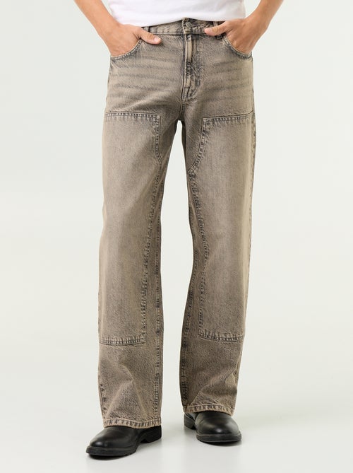 Jean baggy uni avec empiècements fantaisies - Kiabi Jean baggy uni avec empiècements fantaisies - Kiabi