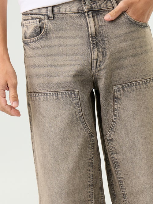 Jean baggy uni avec empiècements fantaisies - Kiabi Jean baggy uni avec empiècements fantaisies - Kiabi