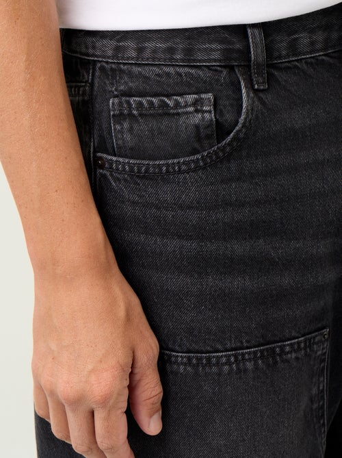 Jean baggy uni avec empiècements fantaisies - Kiabi Jean baggy uni avec empiècements fantaisies - Kiabi