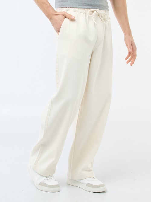 Jean coupe large avec taille élastiquée - Kiabi Jean coupe large avec taille élastiquée - Kiabi