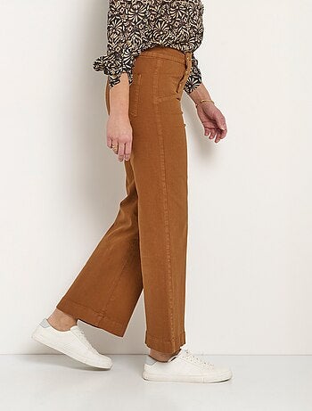 Jean flare extensible taille effet pont