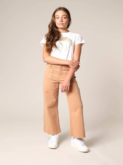 Jean flare fille à poches plaquées. 'Deeluxe' - Kiabi