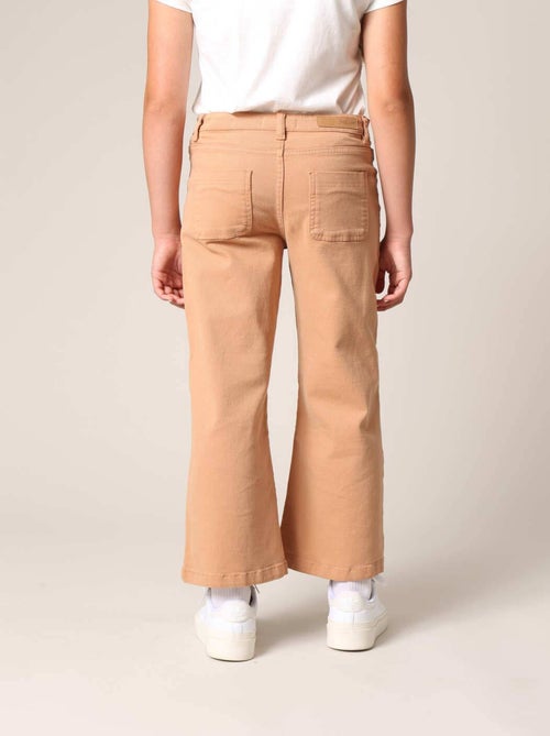 Jean flare fille à poches plaquées. 'Deeluxe' - Kiabi