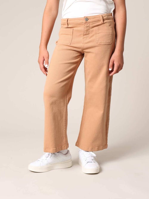 Jean flare fille à poches plaquées. 'Deeluxe' - Kiabi