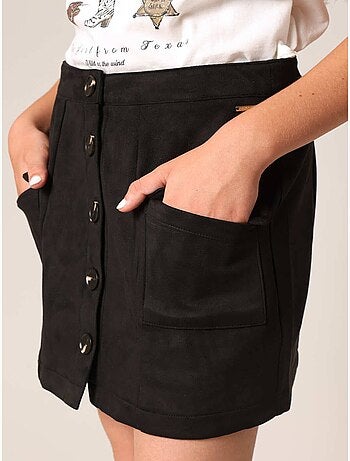 Jean flare fille à poches plaquées. 'Deeluxe'