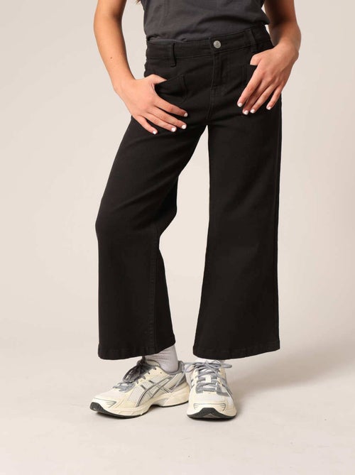 Jean flare fille à poches plaquées. 'Deeluxe' - Kiabi