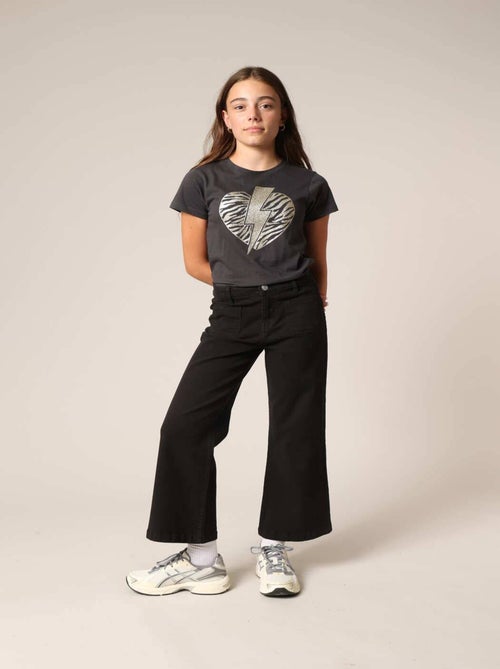 Jean flare fille à poches plaquées. 'Deeluxe' - Kiabi