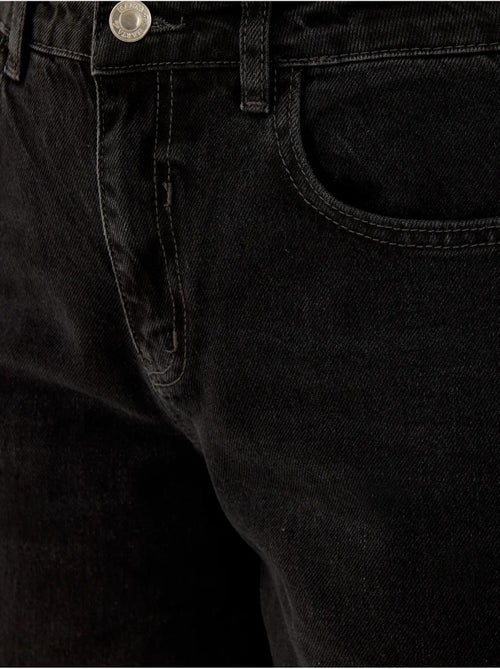 Jean large en denim à effet délavé et coutures apparentes - Kiabi Jean large en denim à effet délavé et coutures apparentes - Kiabi