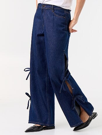 Jean large wide leg avec nœuds fantaisies à la base