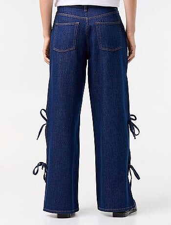 Jean large wide leg avec nœuds fantaisies à la base