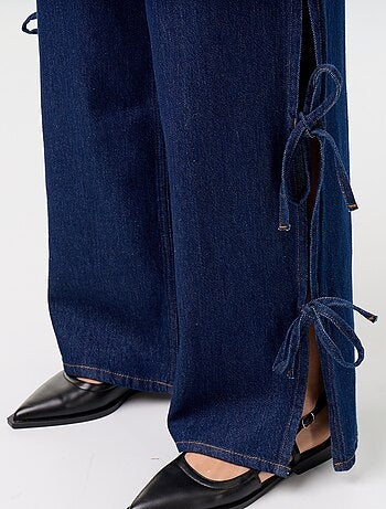 Jean large wide leg avec nœuds fantaisies à la base