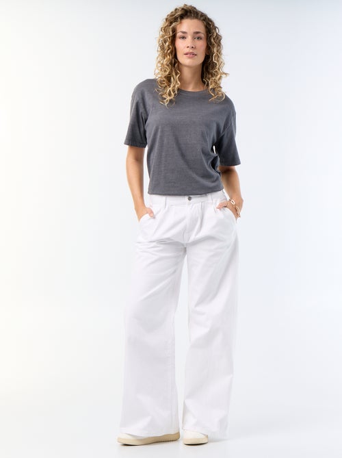 Jean palazzo à coupe large et taille haute - Kiabi Jean palazzo à coupe large et taille haute - Kiabi
