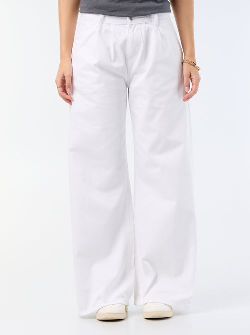 Jean palazzo à coupe large et taille haute - Kiabi Jean palazzo à coupe large et taille haute - Kiabi