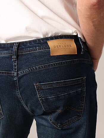 Jean slim homme en denim foncé délavé
'Deeluxe'
