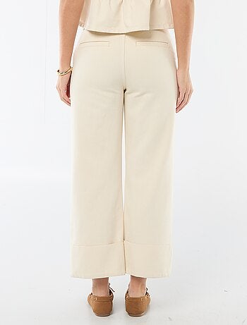 Jean taille haute avec revers en bas