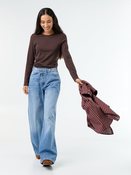 Jean wide avec patte de boutonnage décalée - Kiabi Jean wide avec patte de boutonnage décalée - Kiabi