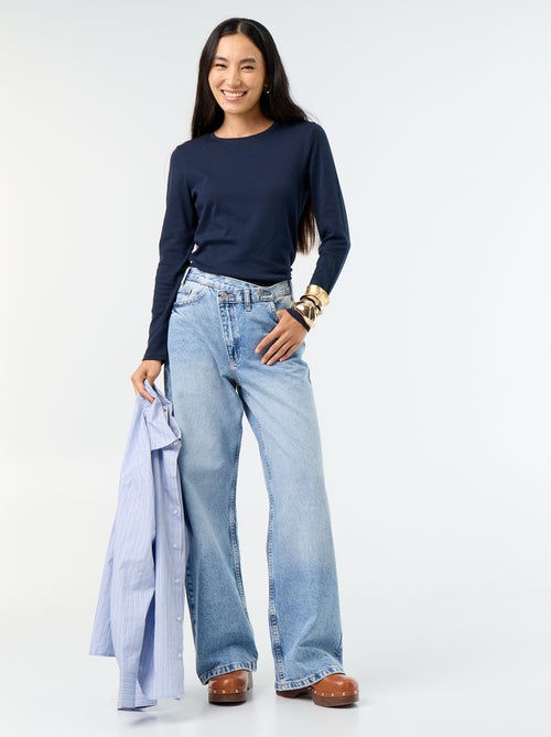 Jean wide avec patte de boutonnage décalée - Kiabi Jean wide avec patte de boutonnage décalée - Kiabi