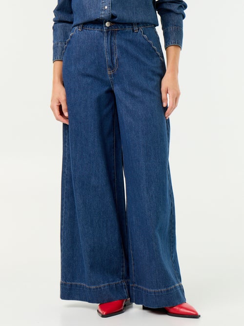 Jean wide leg avec poches découpées - Kiabi Jean wide leg avec poches découpées - Kiabi