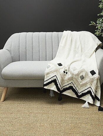 Jeté de canapé éthnique avec pompons