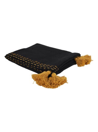 Jeté de canapé surpiqué avec pompons