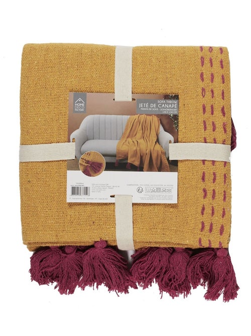 Jeté de canapé surpiqué avec pompons - Kiabi Jeté de canapé surpiqué avec pompons - Kiabi