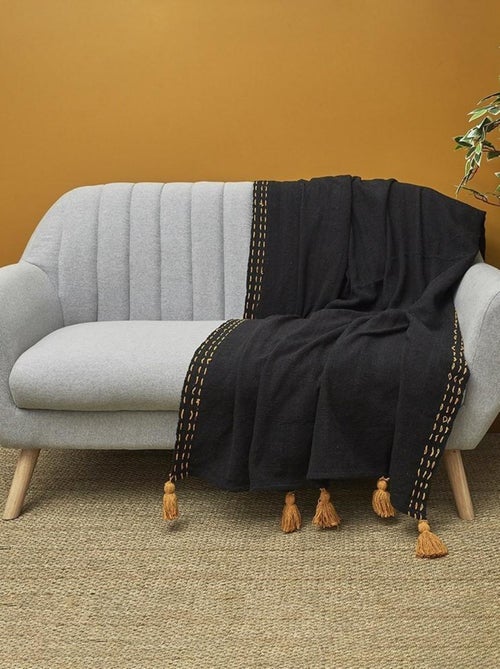 Jeté de canapé surpiqué pompons noir 130x150 cm - Kiabi