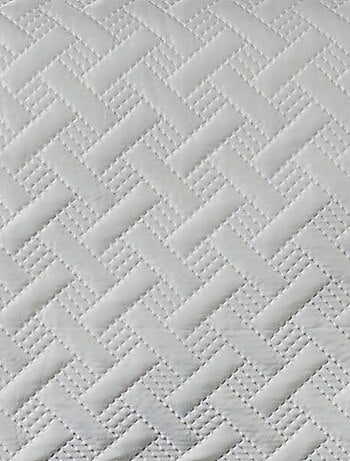 Jeté de lit aux formes géométriques surpiquées