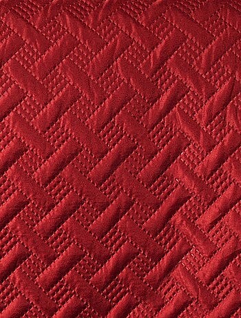 Jeté de lit aux formes géométriques surpiquées