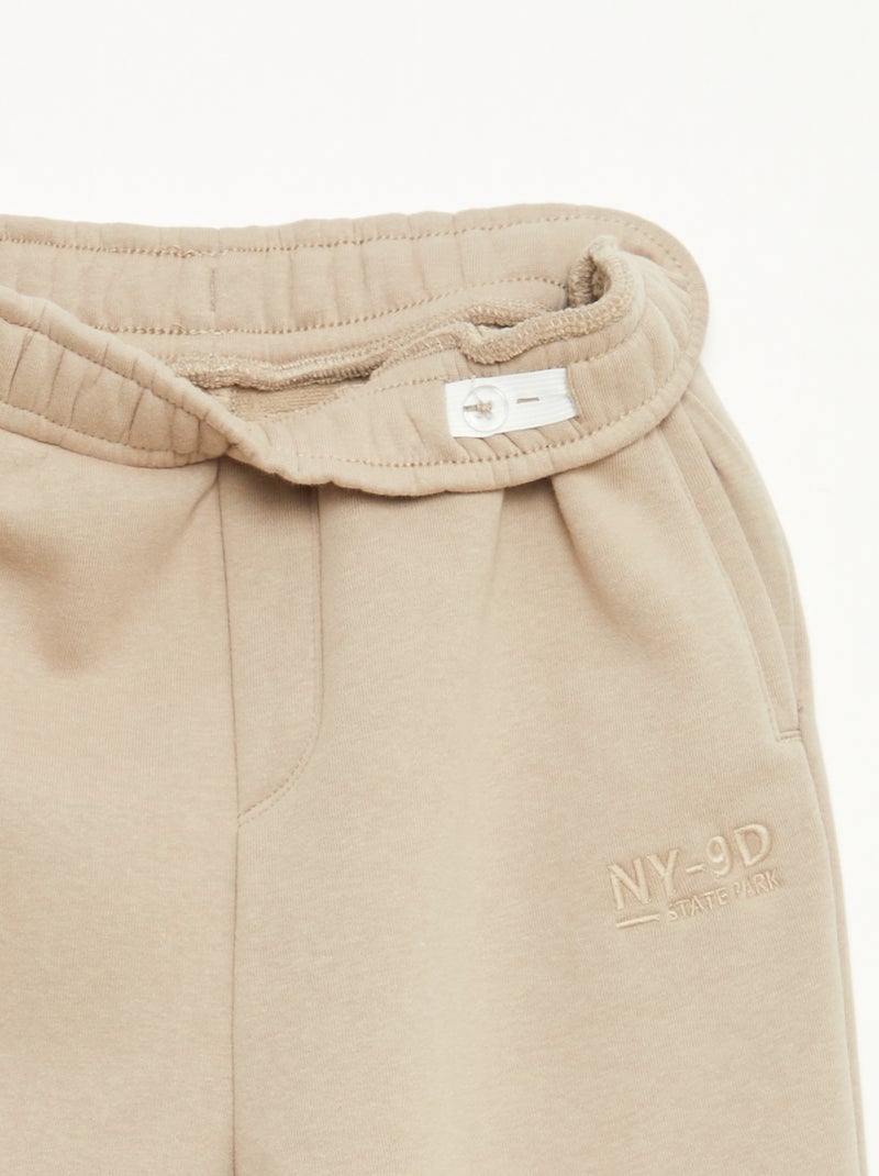 Jogging chaud uni avec doublure polaire Beige - Kiabi