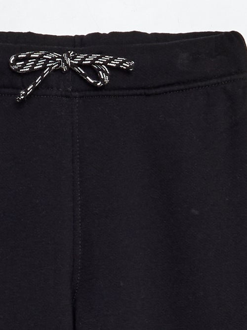 Jogging chiné avec ceinture ajustable - Kiabi Jogging chiné avec ceinture ajustable - Kiabi