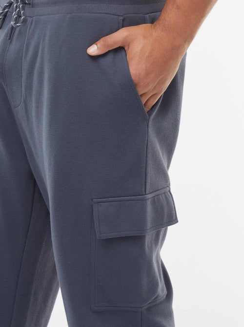 Jogging en maille piquée avec poches à rabat - Kiabi