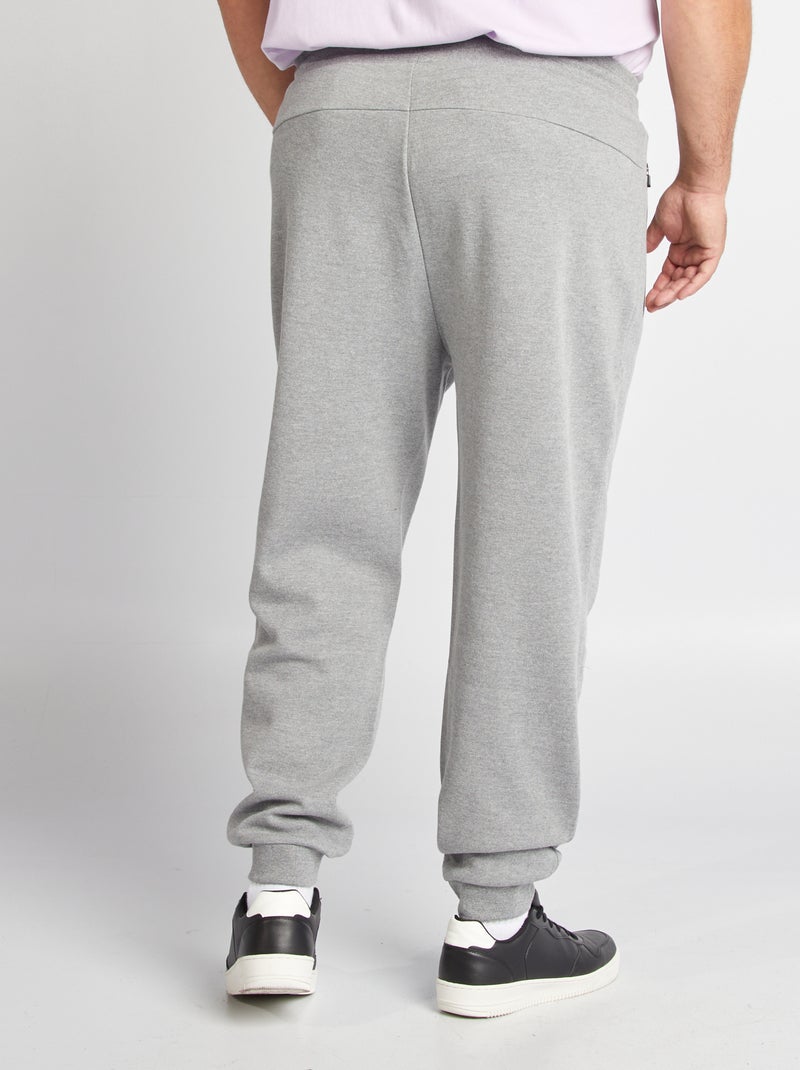Jogging en maille piquée avec poches zippées Gris - Kiabi