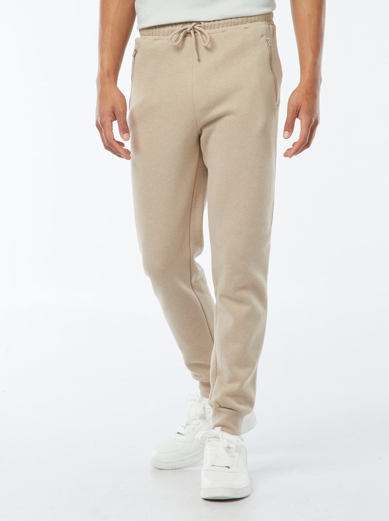 Jogging en molleton gratté avec 2 poches zippées Beige - Kiabi