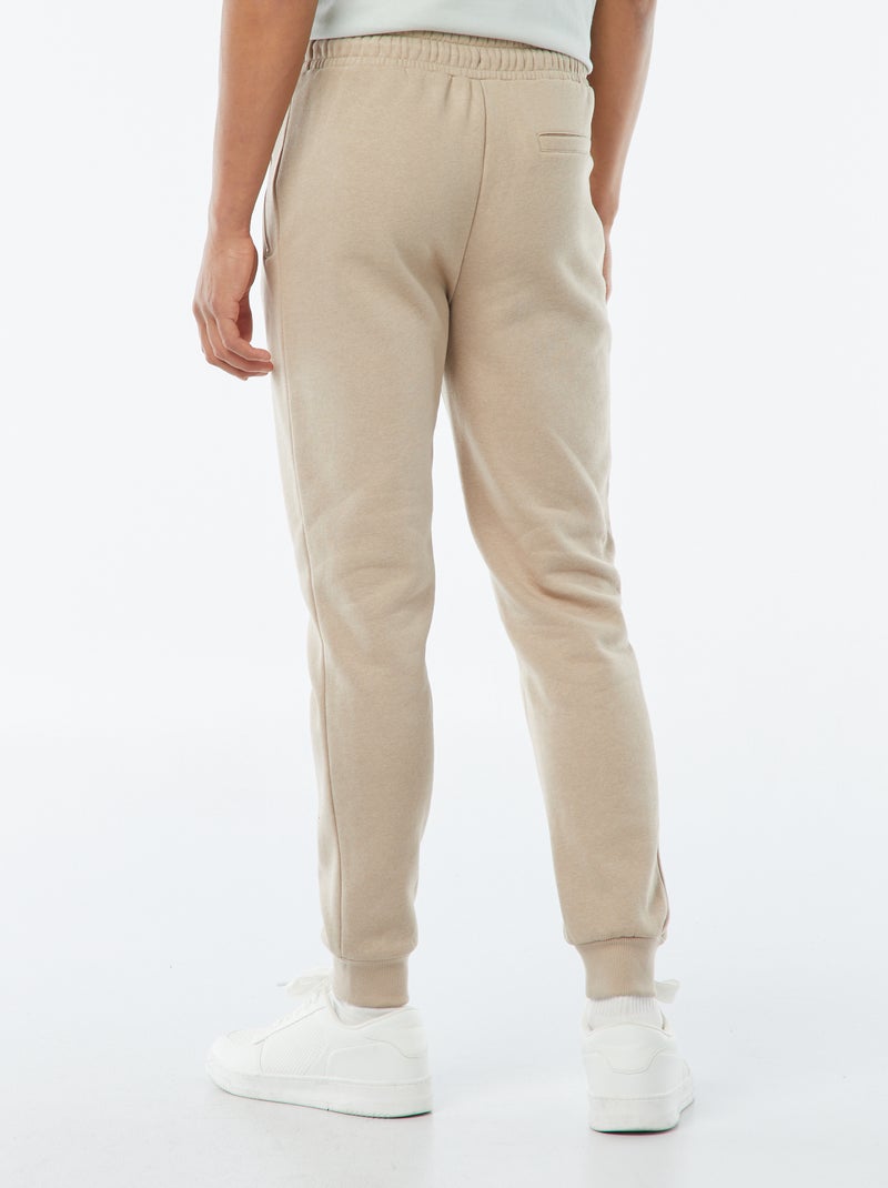 Jogging en molleton gratté avec 2 poches zippées Beige - Kiabi