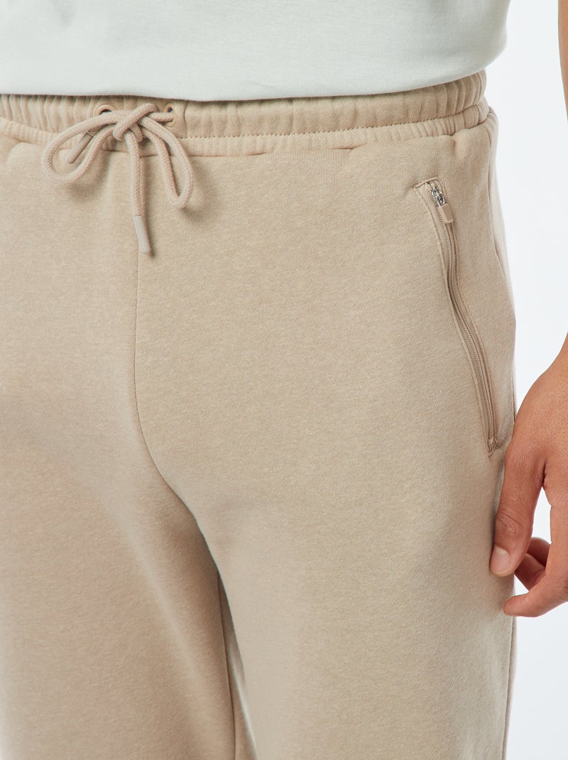 Jogging en molleton gratté avec 2 poches zippées Beige - Kiabi