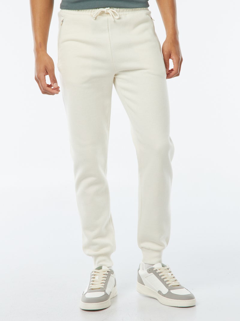 Jogging en molleton gratté avec 2 poches zippées Blanc cassé - Kiabi