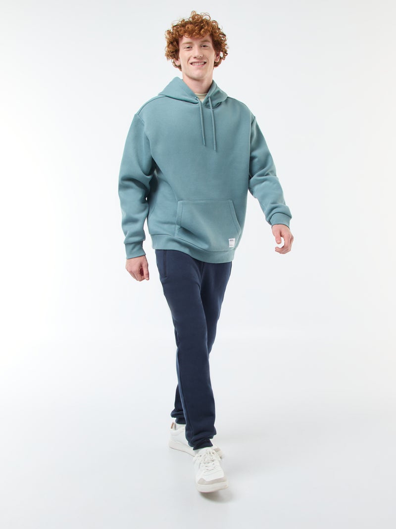 Jogging en molleton gratté avec 2 poches zippées Bleu marine - Kiabi