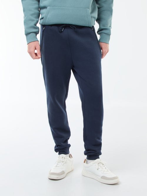 Jogging en molleton gratté avec 2 poches zippées - Kiabi