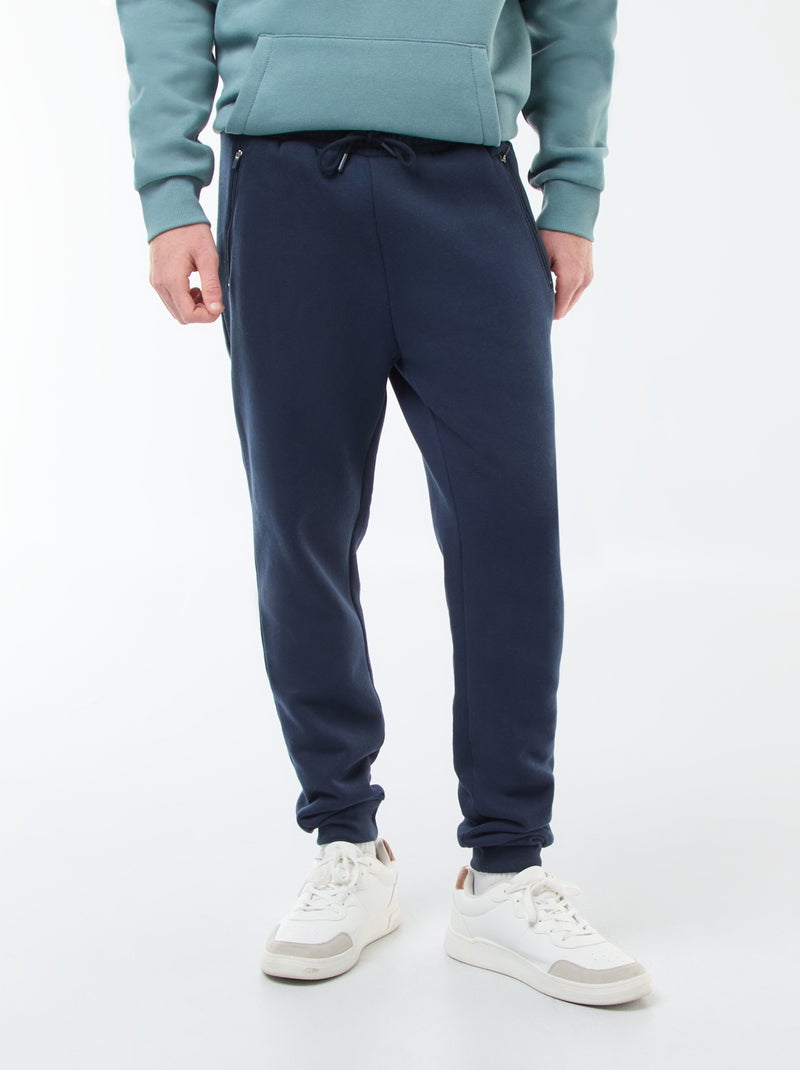 Jogging en molleton gratté avec 2 poches zippées Bleu marine - Kiabi