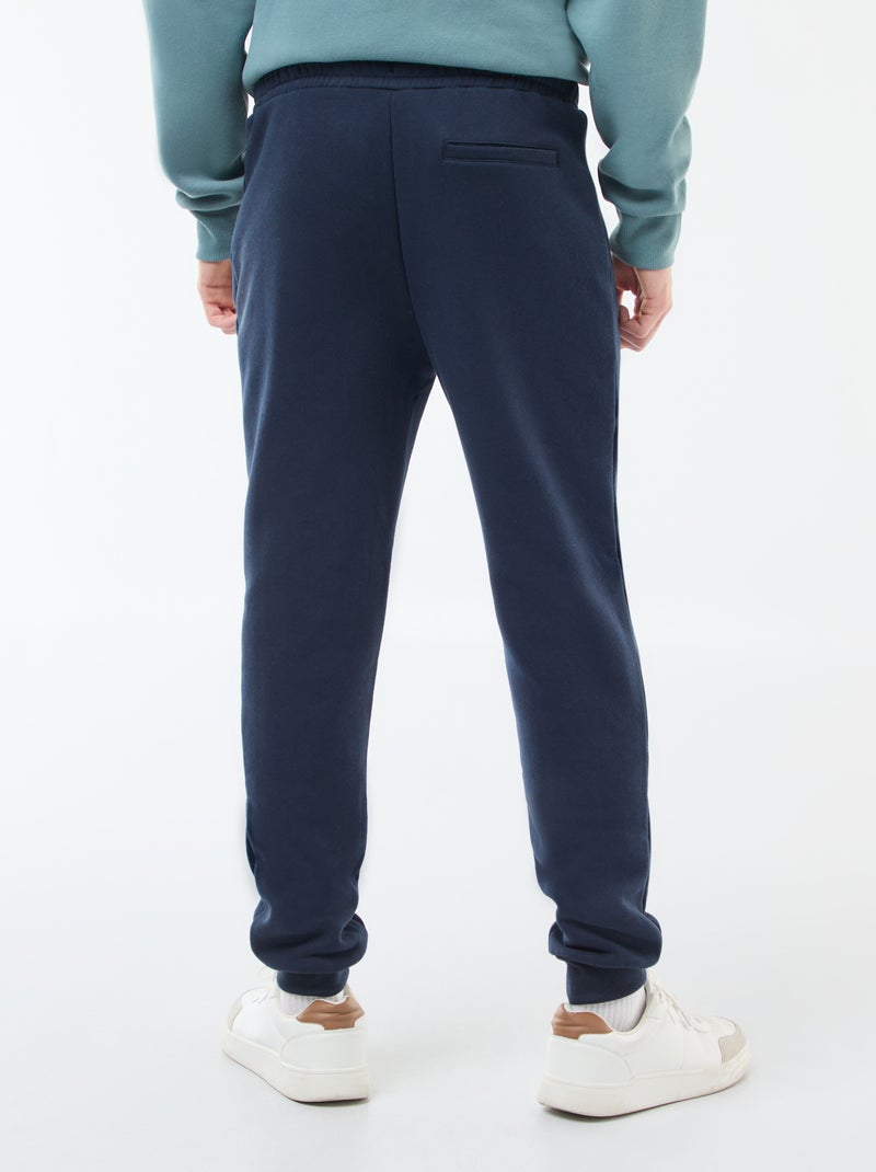 Jogging en molleton gratté avec 2 poches zippées Bleu marine - Kiabi