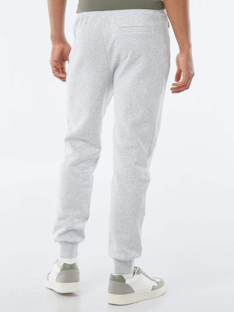 Jogging en molleton gratté avec 2 poches zippées Gris clair - Kiabi