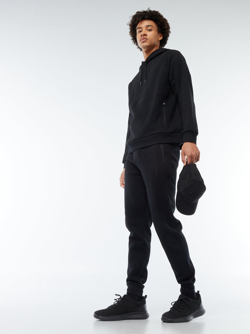 Jogging en molleton gratté avec 2 poches zippées noir - Kiabi