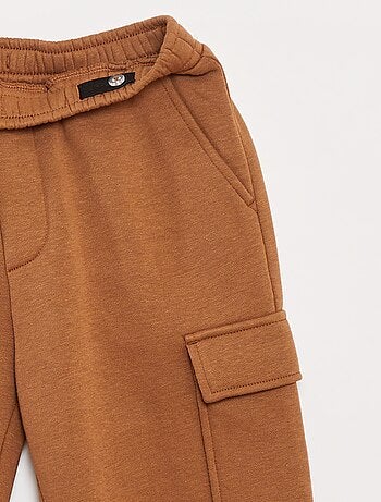 Jogging en molleton uni multi-poches