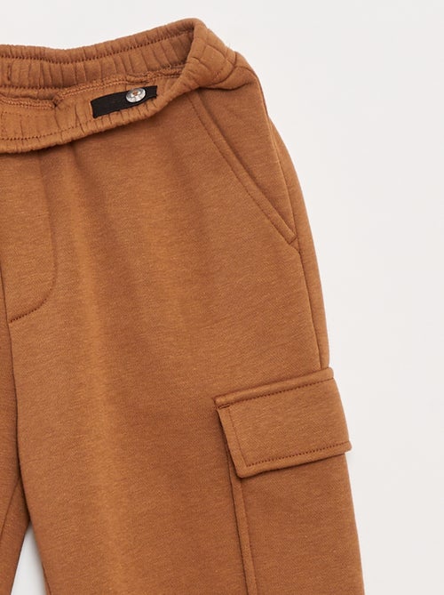 Jogging en molleton uni multi-poches - Kiabi