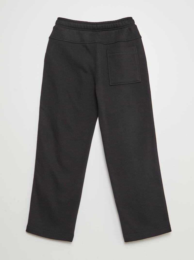 Jogging large avec bandes contrastantes Noir - Kiabi