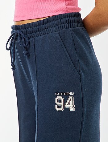 Jogging large avec imprimé sportswear