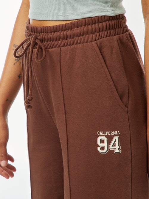 Jogging large avec imprimé sportswear - Kiabi